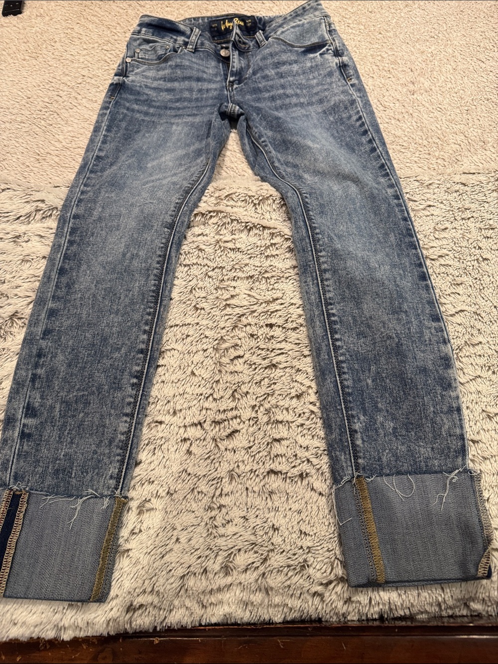 Ladies Indigo Rein Distressed Light Blue Straight-Leg Jeans with Rolled Hem.
